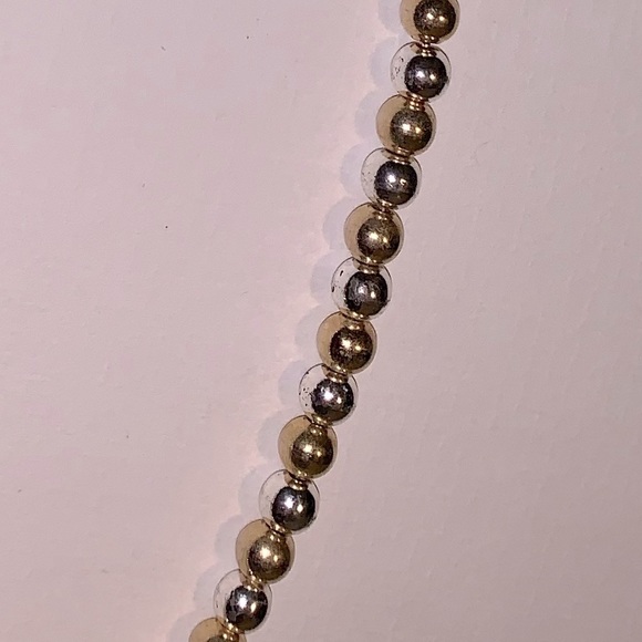 Jewelry - Beaded Necklace alternates silver and gold